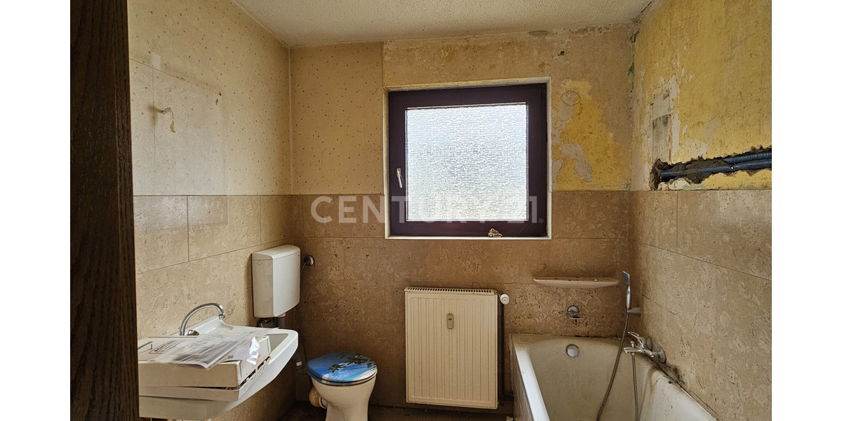 Attraktive Kapitalanlage mit Potenzial: Mehrfamilienhaus mit 6 Eigentumswohnungen & Garagen in Hemer - Mehrfamilienhaus, Wohnhaus Hemer | Angebot:27469088